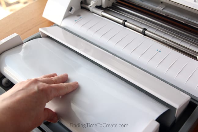 Feed vinyl through roll feeder - Finding Time To Create